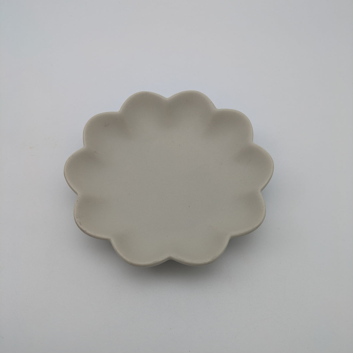 Untersetzer Blüte beige